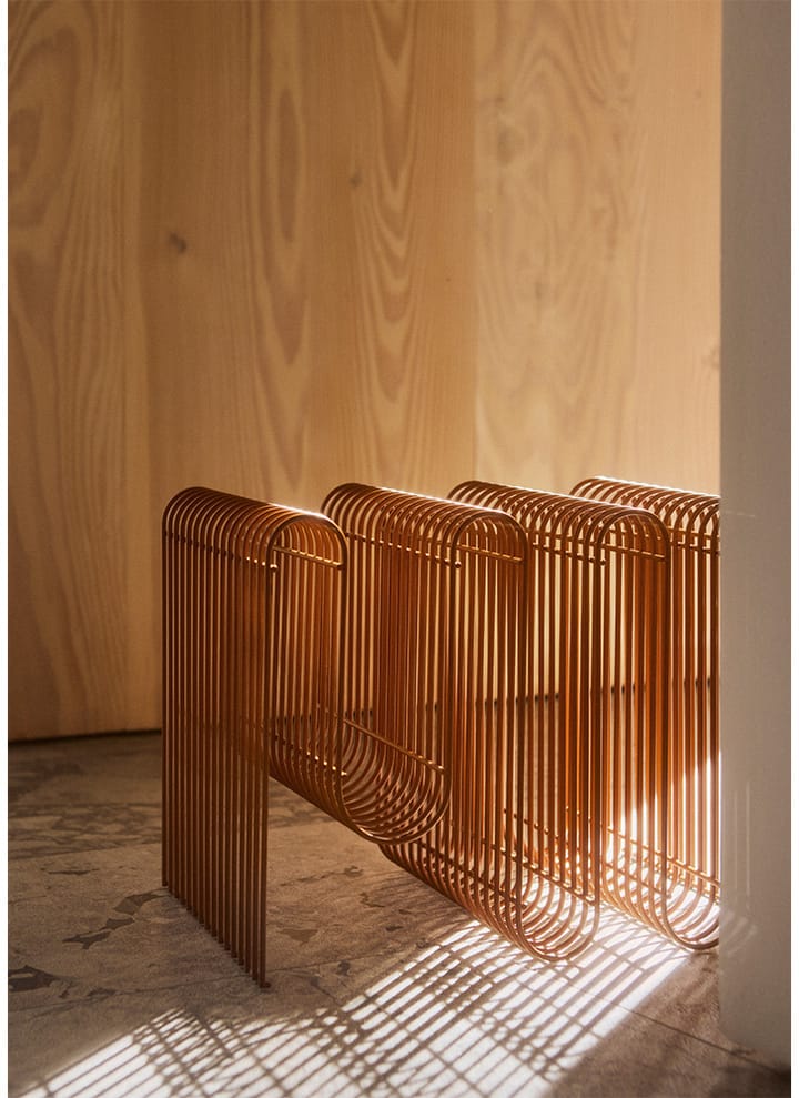 Curva tidningsställ, Amber AYTM