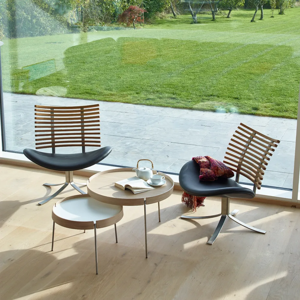 Gepard GM 4175 loungefåtölj, läder select svart, oljad ekrygg, rostfritt stålstativ Naver Collection