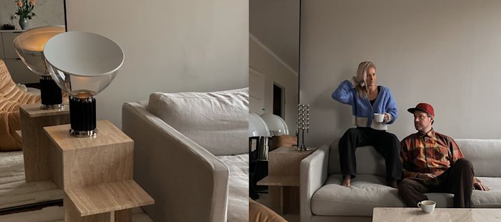 Hemma hos kreatören Elin Lannsjö finns det gott om mysig belysning, här syns Taccia bordslampa från Flos i vardagsrummet, placerad på ett vackert sidobord i sten.